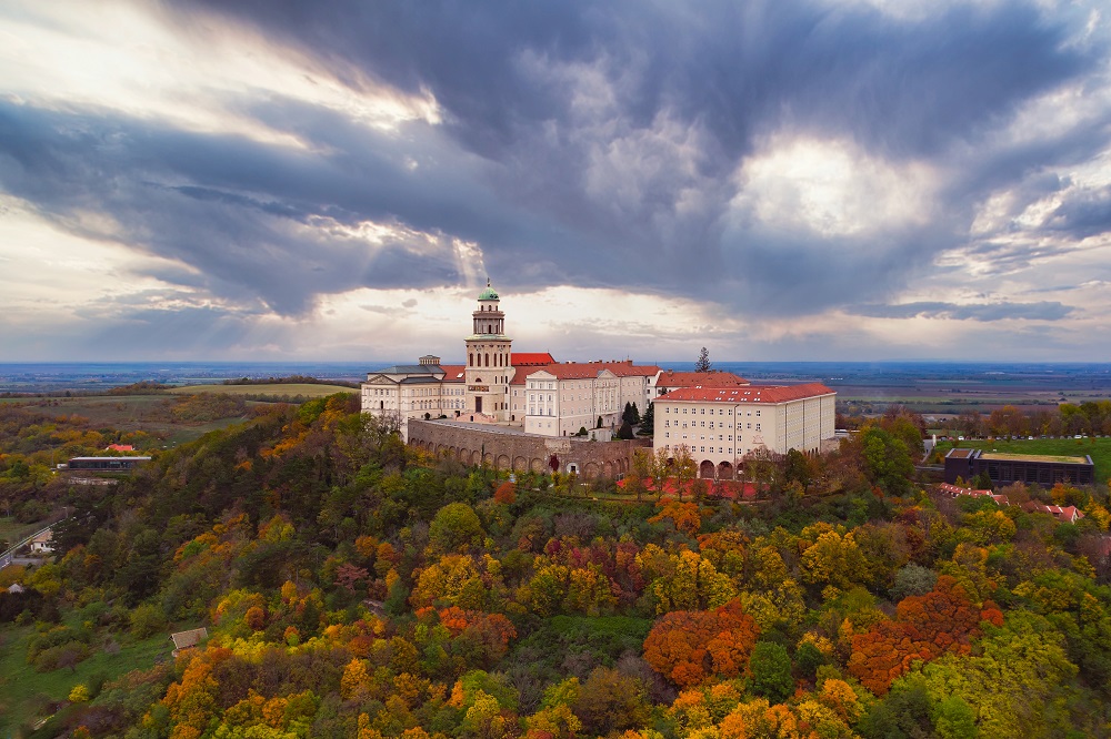 Fantastic arieal photo of Pannonhalama Benedictine abbey in Hungary. Amazing historical building with a beautiful church and library. Popular tourist destination with guided tours